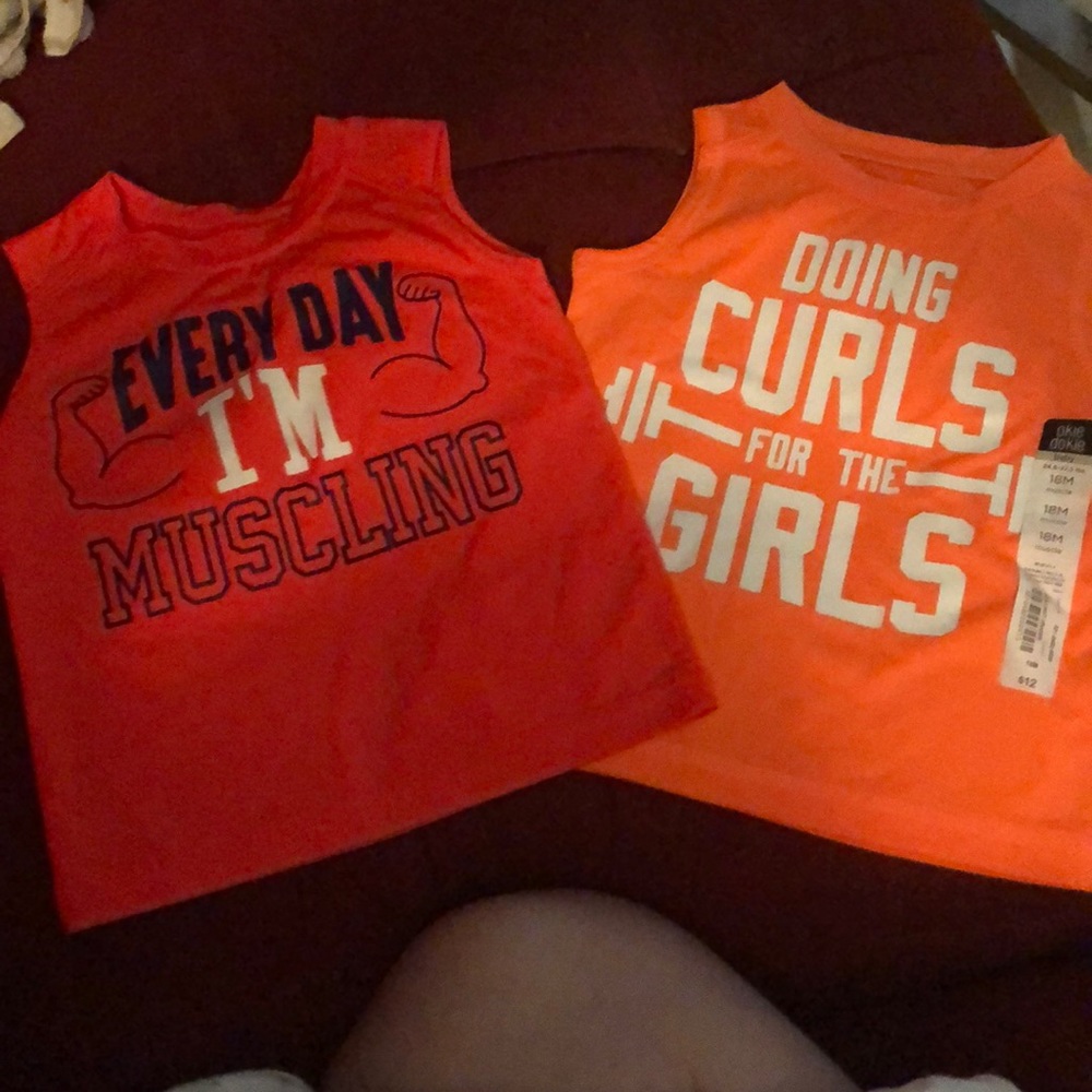 (2) Size 18 month okie dokie muscle shirt.